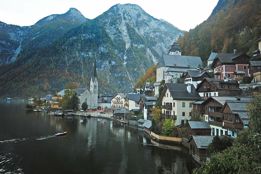 HD wallpaper: brown and gray houses beside lake and mountains, europe ...