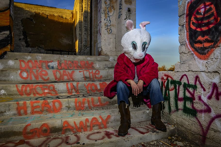 person wearing white mascot sitting on gray concrete stairs, photo of man sitting and wearing rabbit mask HD wallpaper