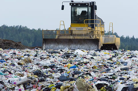 yellow and black tractor on garbage island during daytime, landfill HD wallpaper