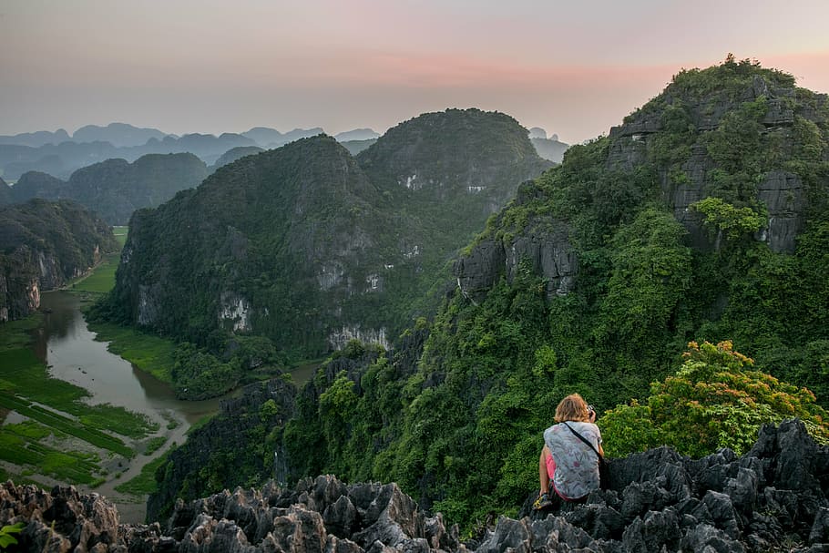 person sitting on cliff while taking photo, mountain, landscape HD wallpaper