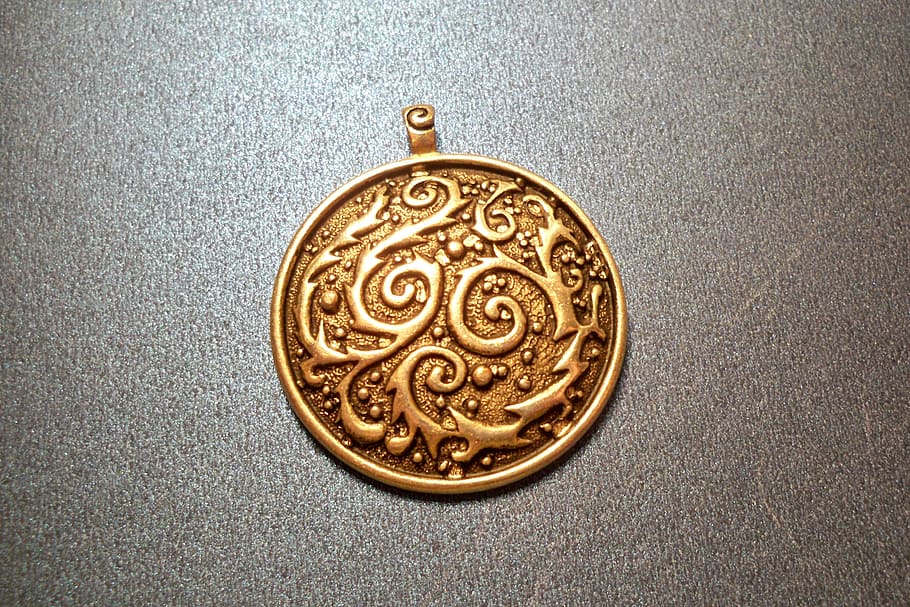 round gold-colored pendant, medallion, jewelry, metal, focal