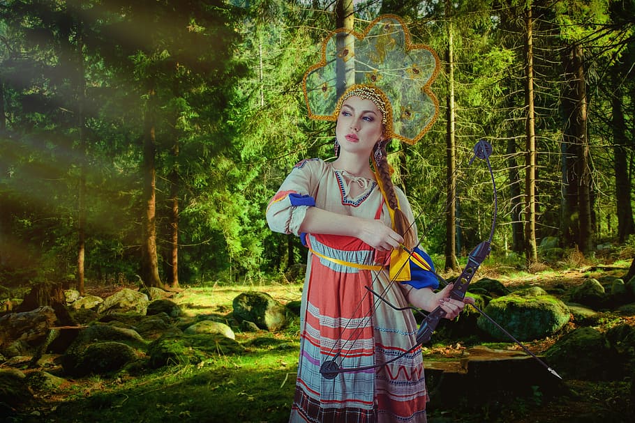 woman holding bow and arrow, russkaya krasavica, russia, girl