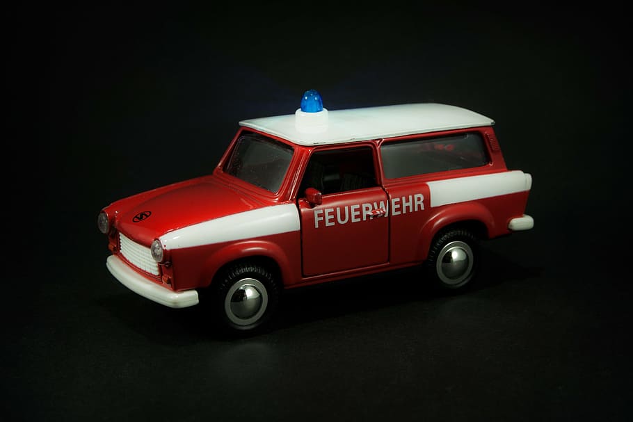 red and white Feuer Wehr car miniature, satellite, fire, ddr