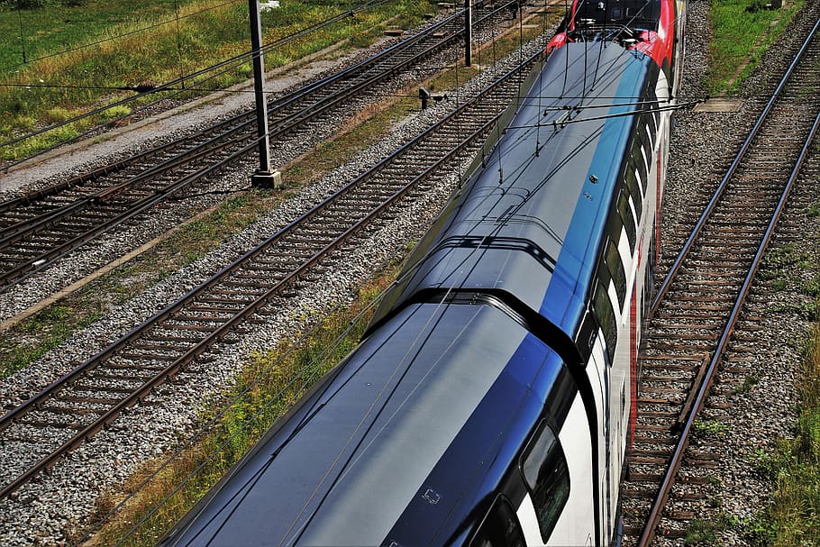 aerial photography of black and white train during daytime HD wallpaper