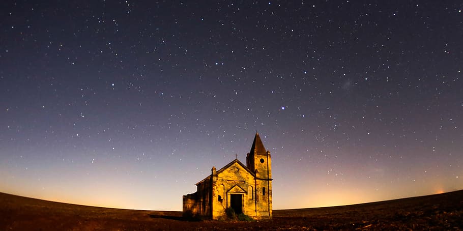 worm's eye view photography of cathedral under gray skies filled of stars, brown concrete chapel HD wallpaper