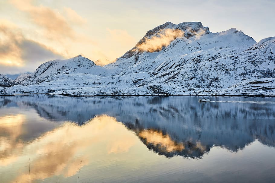 mountain with snow and reflection on water, reflection of mountain on body of water during daytime HD wallpaper