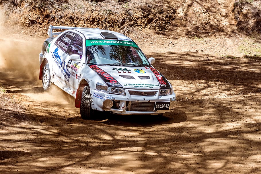 white Mitsubishi Lancer on brown soil, action, aphrodite, auto HD wallpaper