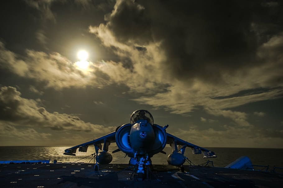 jet plane near body of water, moon, aircraft carrier, sea, marines