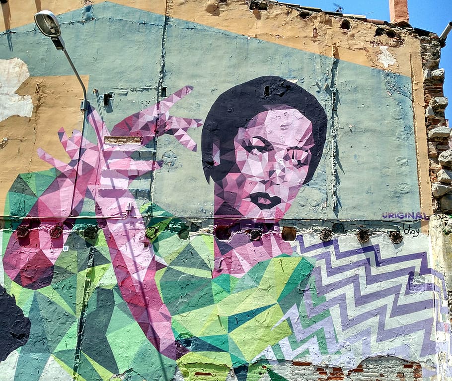 woman making hand signs wall art, street art, painted, look, indigent