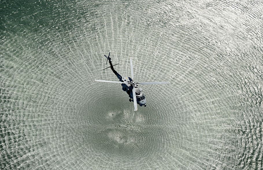 black helicopter forming water ripple, open water, chopper HD wallpaper