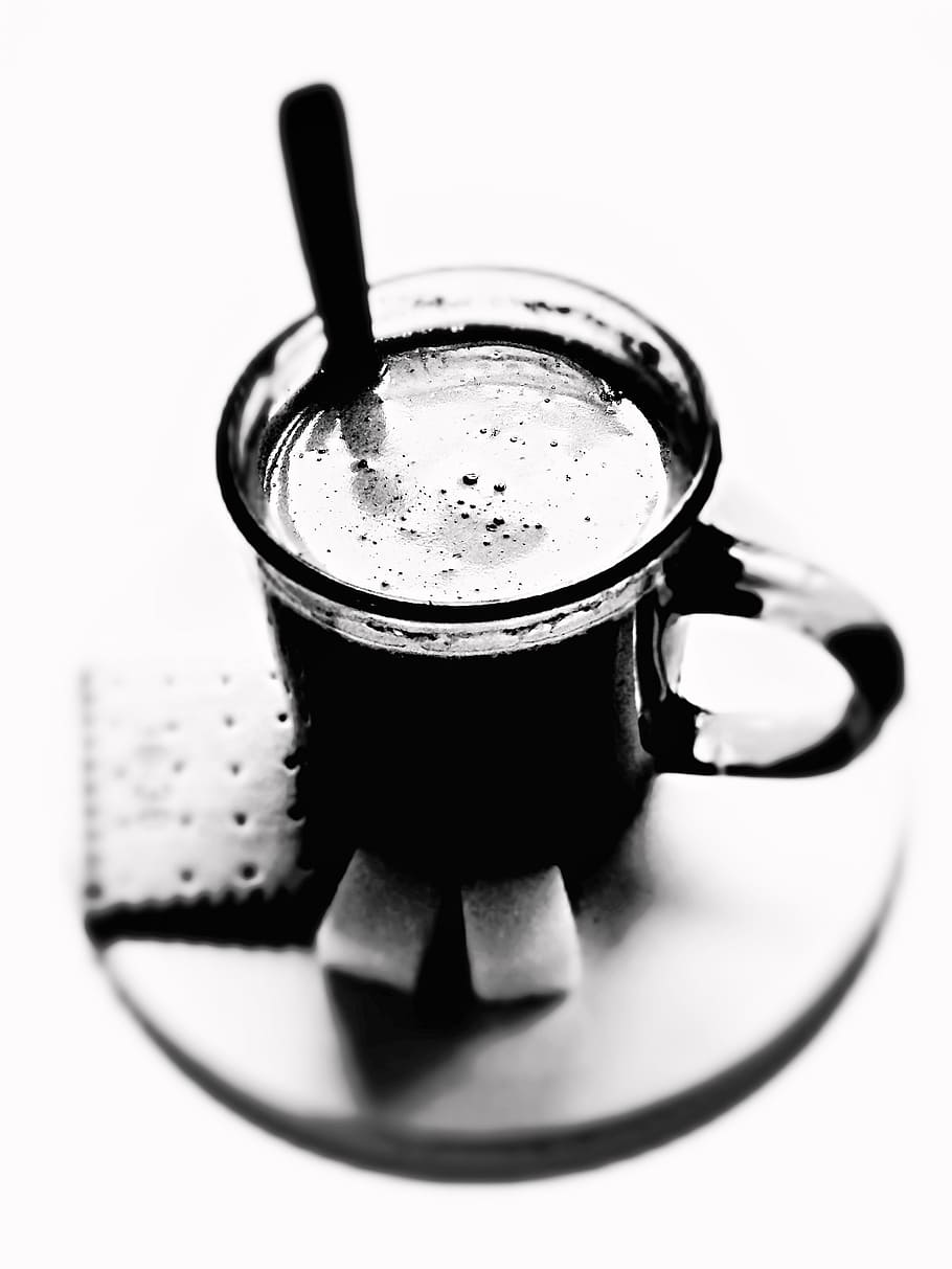 grayscale focus photography of cup on saucer with biscuits HD wallpaper
