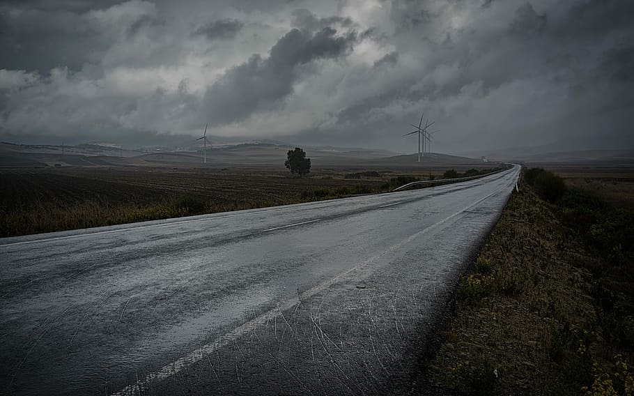 gray asphalt road in between green grass fielsd, photography of road at daytime HD wallpaper