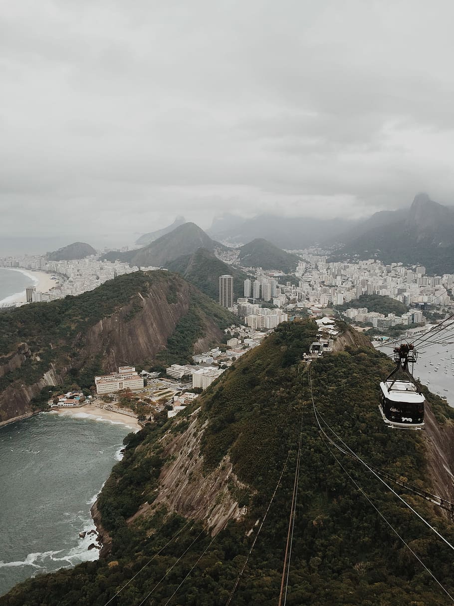 aerial photography of cable car above tree covered mountain, aerial view photo of black and white cable car HD wallpaper