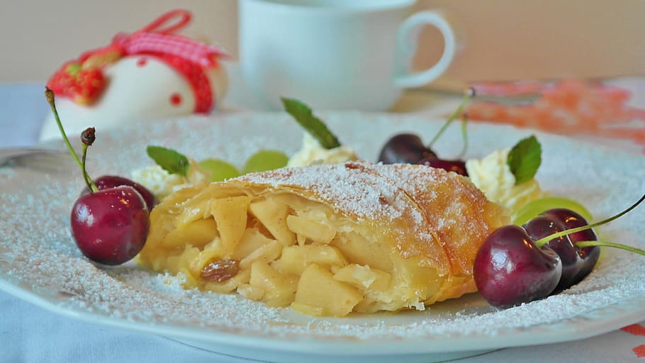 pastry in between of cherries filled with sugar served on plate HD wallpaper