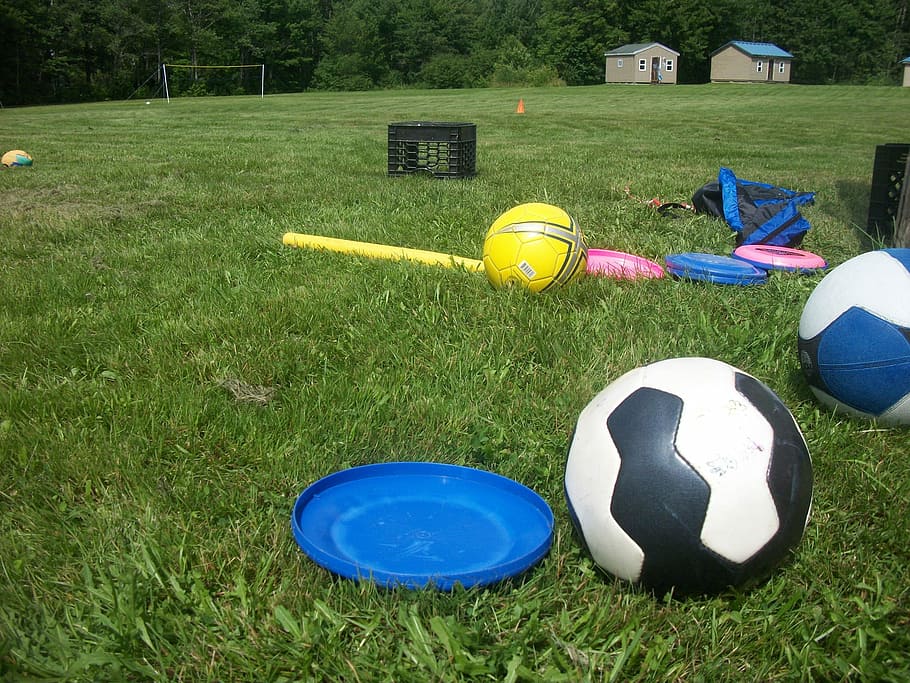 blue flying disc next to black-and-white soccer ball, Soccer, Kick