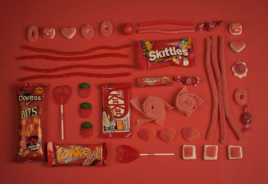 assorted candies and chocolate pack, assorted-color candies and chocolate packs HD wallpaper