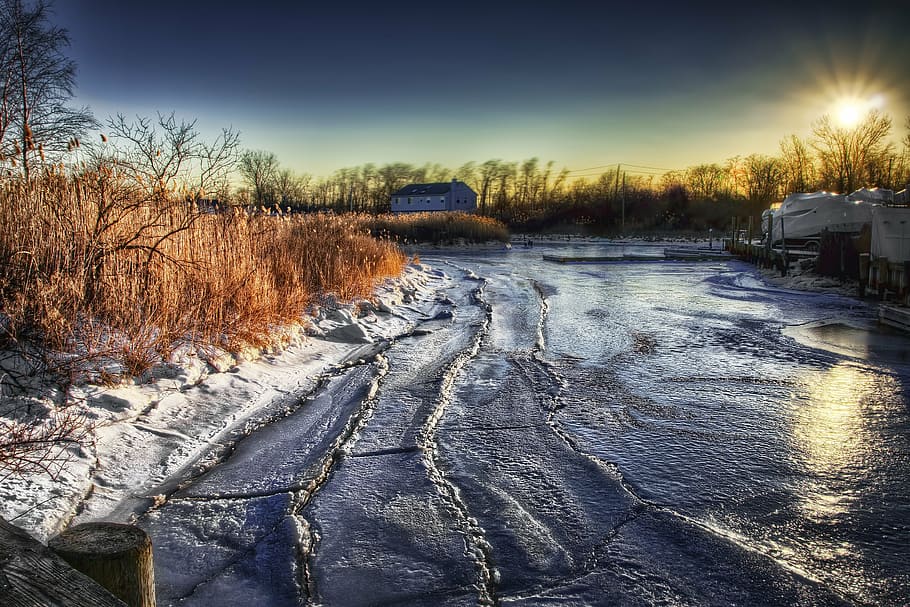 wavy body of water near brown field, frozen, winter, ice, cold HD wallpaper