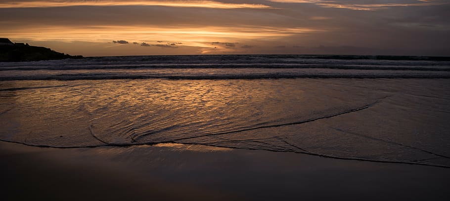 sunset, orange, sea, beach, rate, rocks, sky, clouds, mountain HD wallpaper