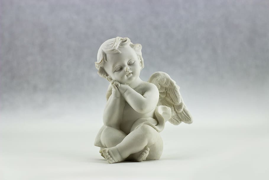 shallow focus photography of angel figurine, wings, love, white
