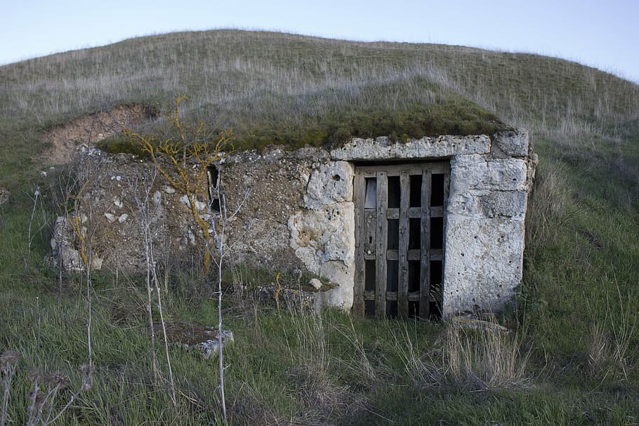 concrete tunnel with wooden doors on mountain, wine, dungeon HD wallpaper