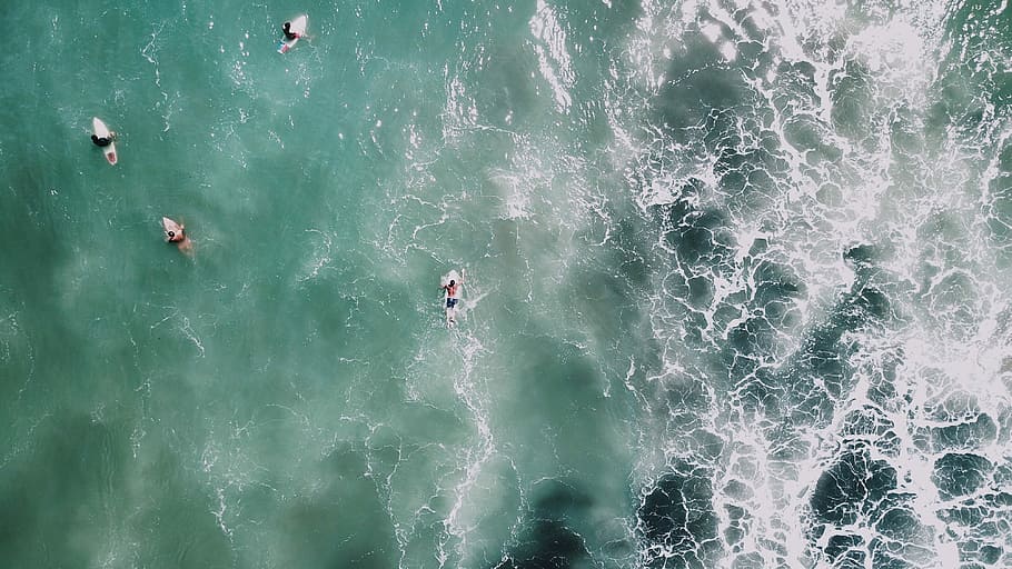 body of water, photo of four people riding on surfboard with waves HD wallpaper