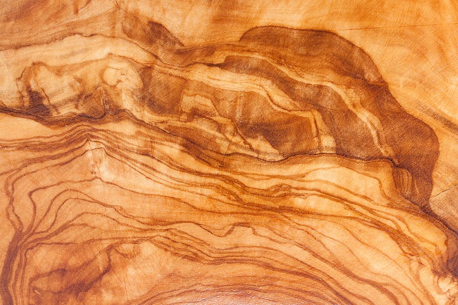 closeup photo of wood, olive wood, grain, cutting board, structure