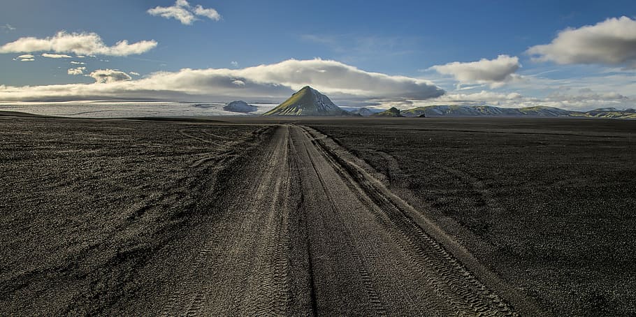 road near mountain, wide angle photo of brown road under cloudy sky HD wallpaper