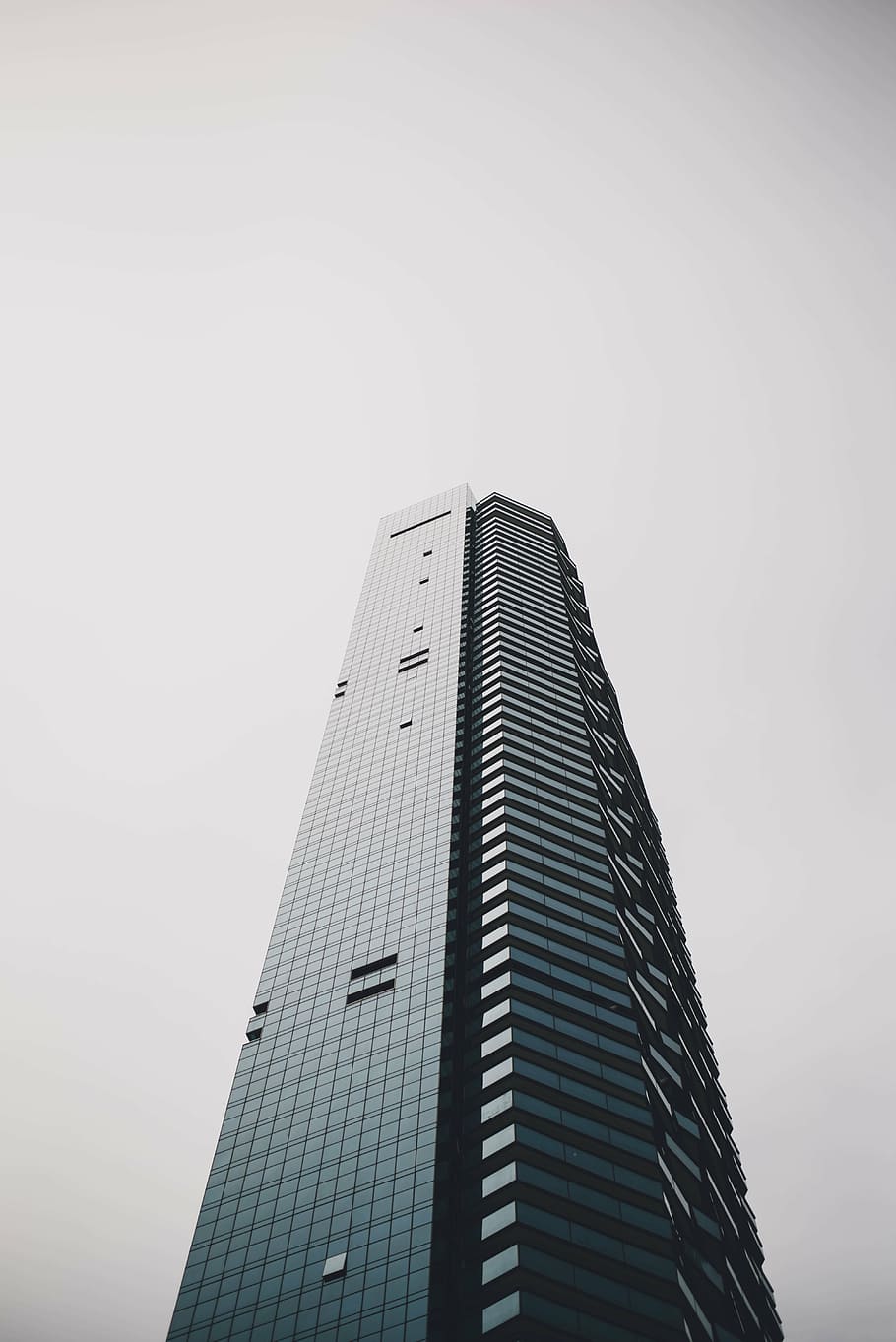blue concrete building, gray, high, rise, white, cloudy, sky HD wallpaper