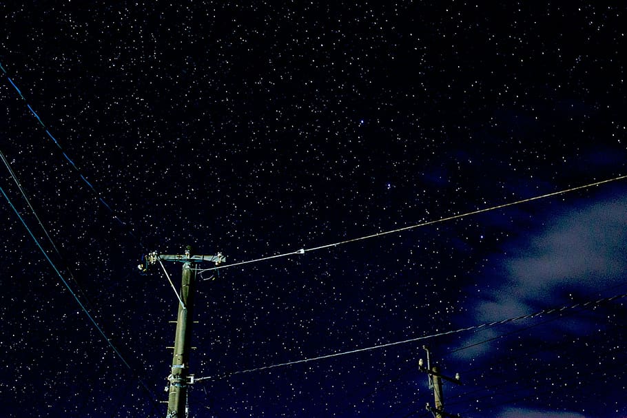 gray wooden antenna post under black sky, electricity, utility HD wallpaper