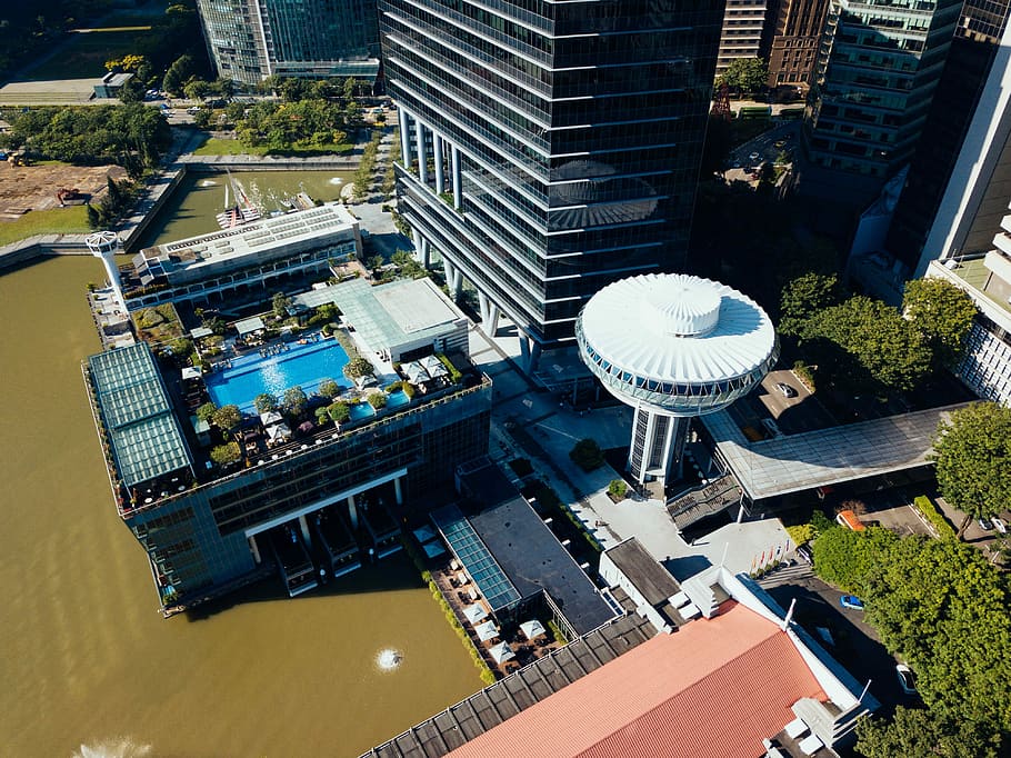 aerial view of glass buildings, aerial photo of buildings, water HD wallpaper
