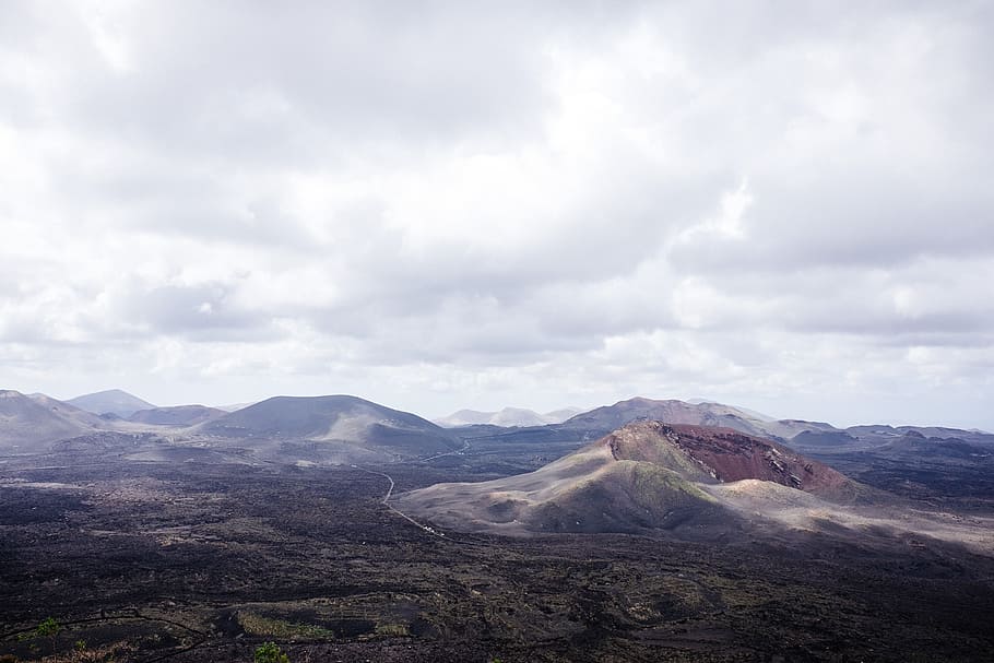 aerial view of mountains, green mountain under white clouds, aerial photography HD wallpaper