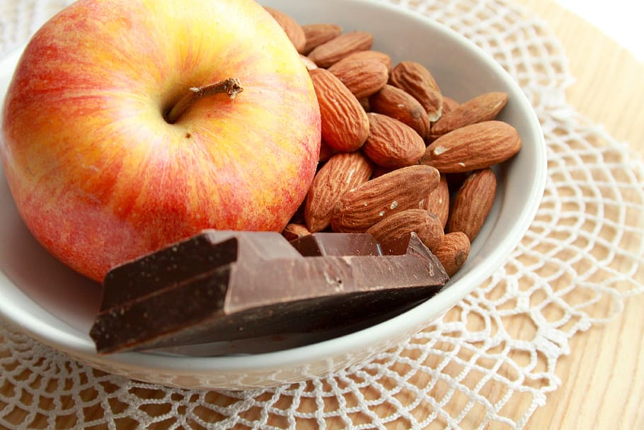 apple, chocolate, and almonds in white ceramic bowl, ingredients HD wallpaper