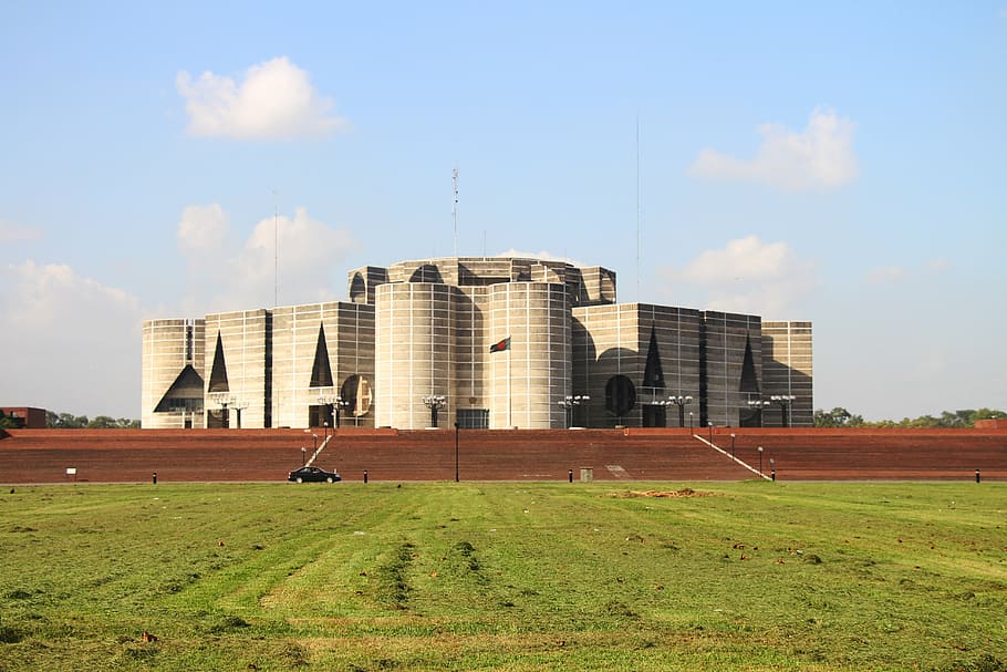 brown concrete building, bangladesh, flag, parliament, architecture