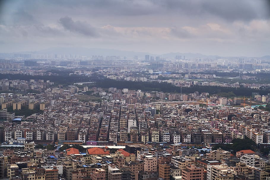 aerial view of city under cloudy sky during daytime, building HD wallpaper
