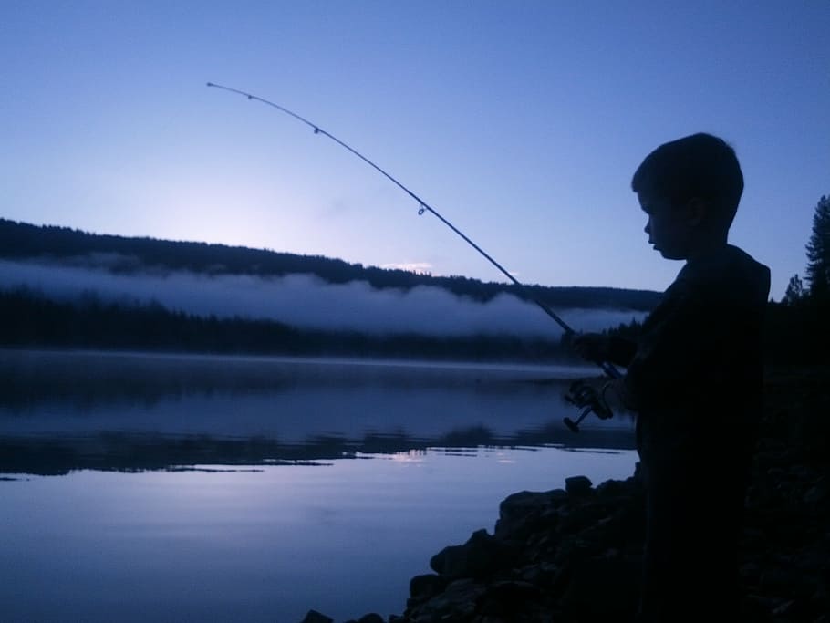 boy fishing on body of water, jp, california, sunrise, child