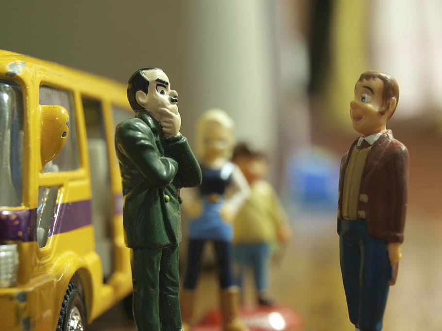 man in green top in front man in brown top figurines, figures HD wallpaper
