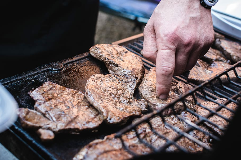 Beef steaks barbeque, cooking, grilling, hands, meat, outside HD wallpaper