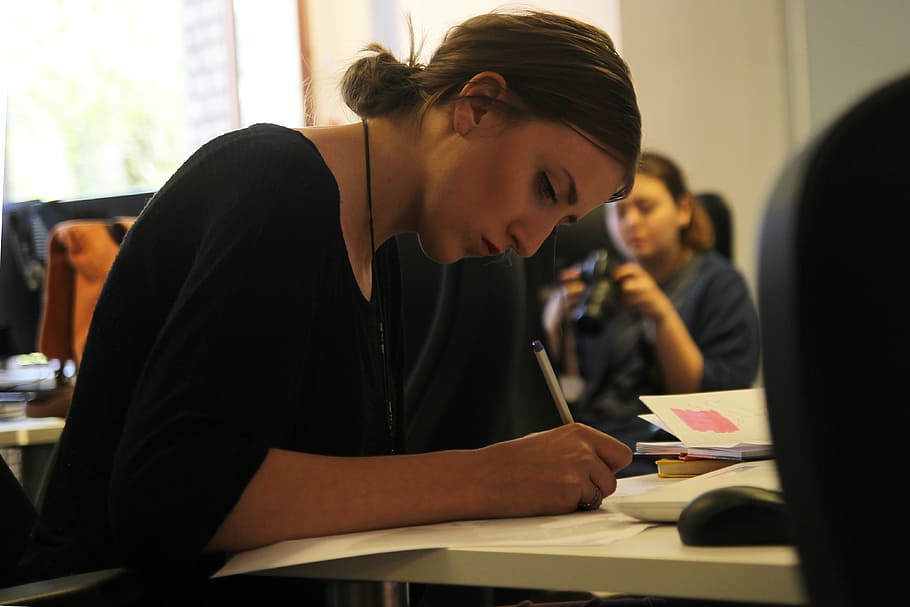 woman holding pen while writing, work, office, architect, designer, HD wallpaper