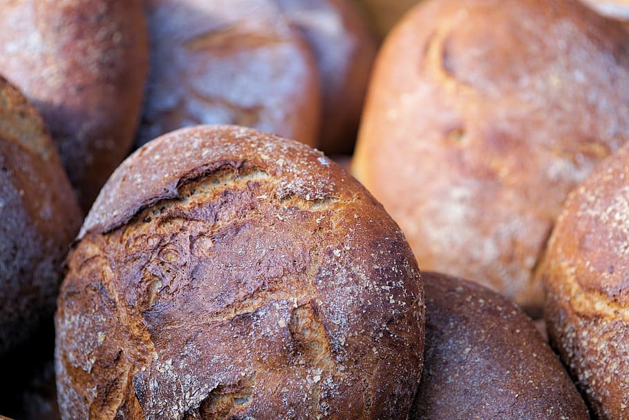 selective focus photography of brown stones, bread, farmer's bread HD wallpaper
