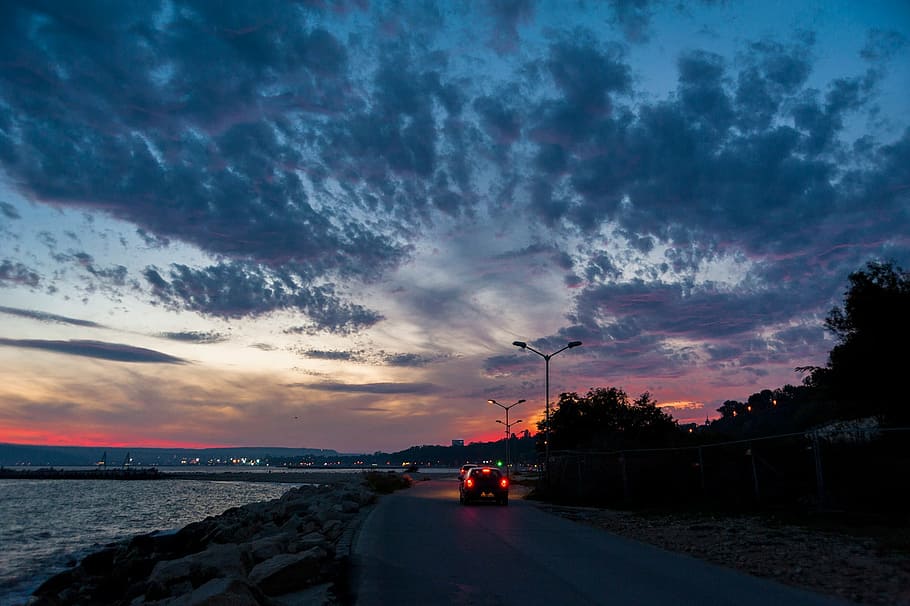 sky, clouds, nature, sunset, dramatic, sea, stop lights, car HD wallpaper