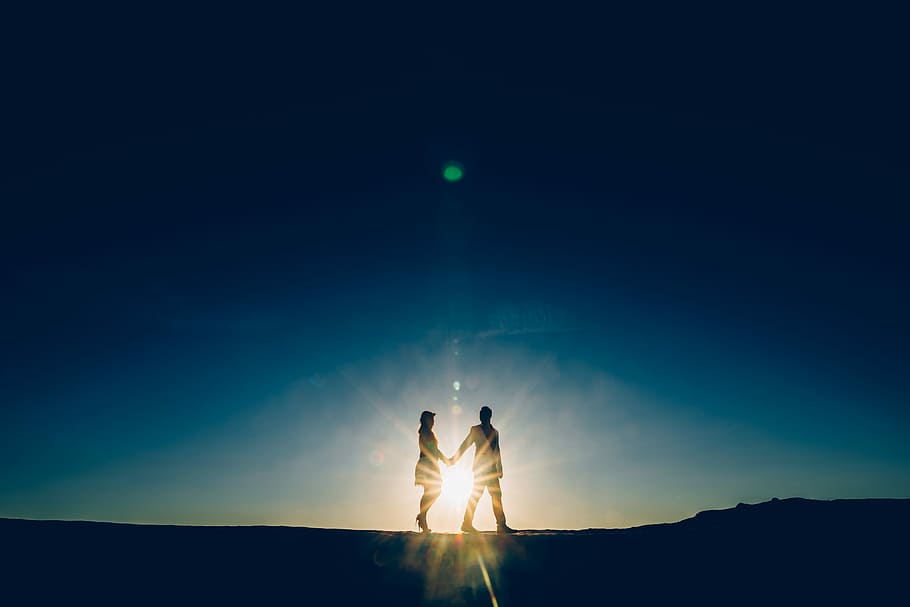 silhouette of couple holding hands while walking, elopment, person