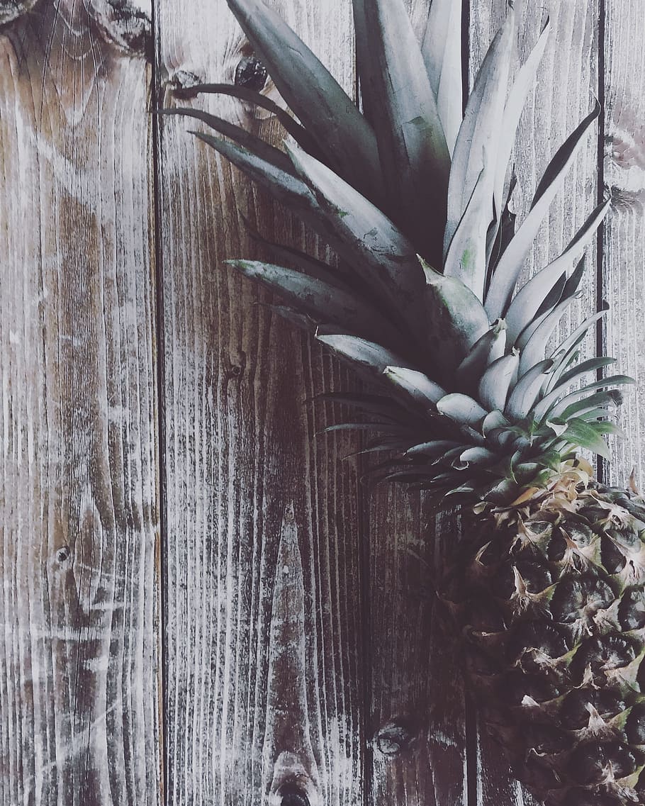 photo of pineapple on brown wooden table, fruit, flat lay, overhead HD wallpaper