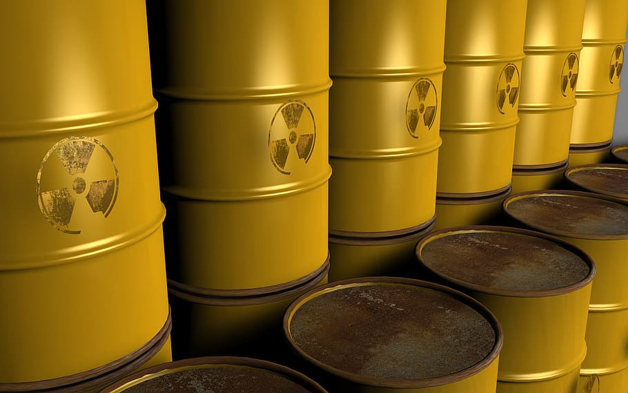 close-up photography of yellow metal tank lot, atom, barrel HD wallpaper