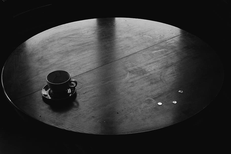 black ceramic teacup on black ceramic saucer, grayscale photography of ceramic teacup on round table HD wallpaper