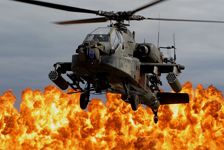 gray apache helicopter with blazing fire background, black, fighter jet