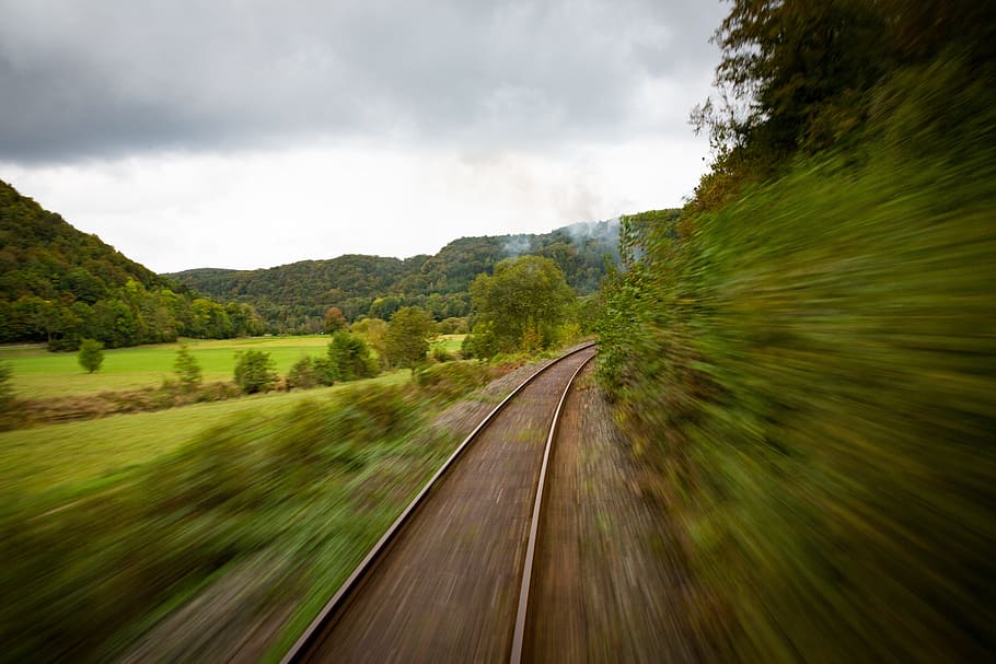 panning photography of brown train rail, travel, seemed, steel, HD wallpaper