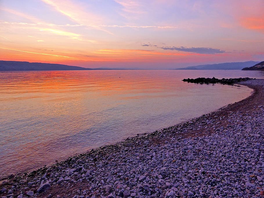 sea stones near to body of water, sunset, beach, seaside, tranquil HD wallpaper