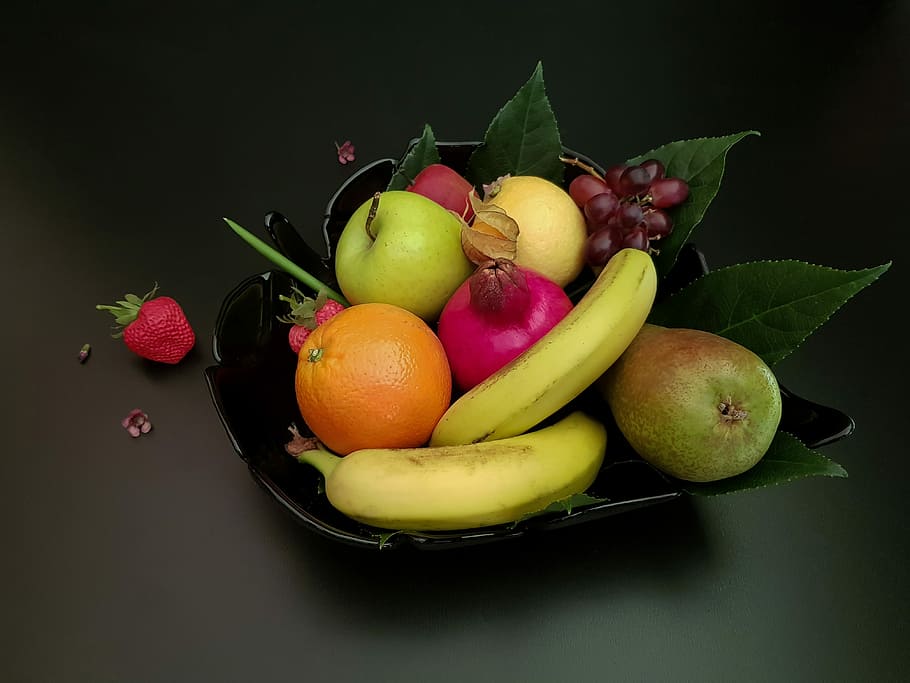 assorted fruits in black fruit bowl, still the fruit bowl of life