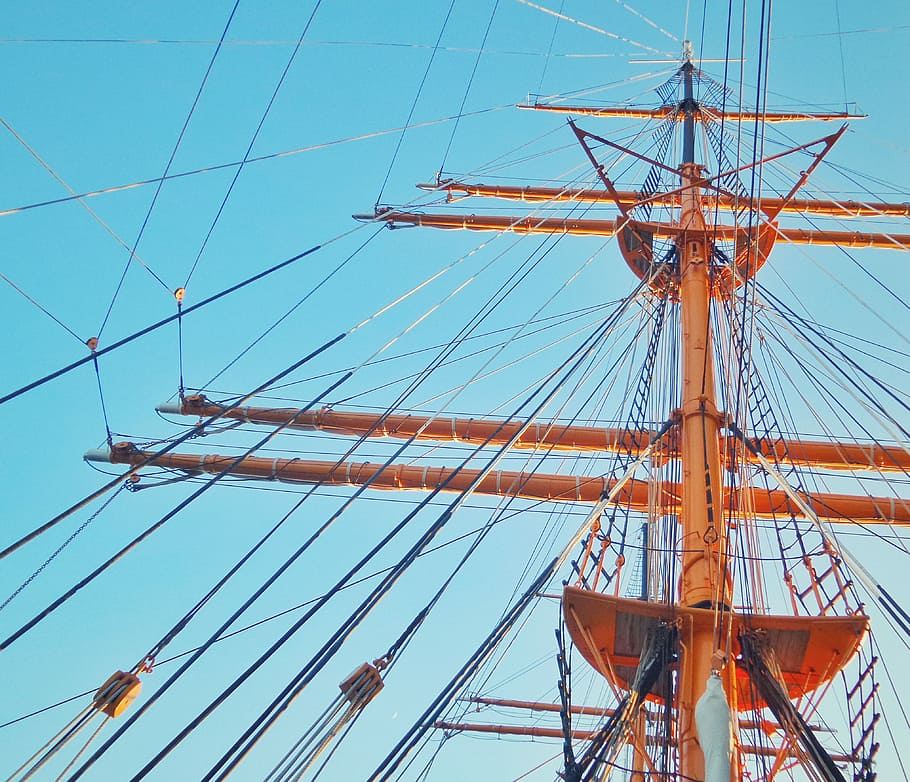 low-angle photography of ship during daytime, low-angle photo of orange wooden ship mast during daytime HD wallpaper
