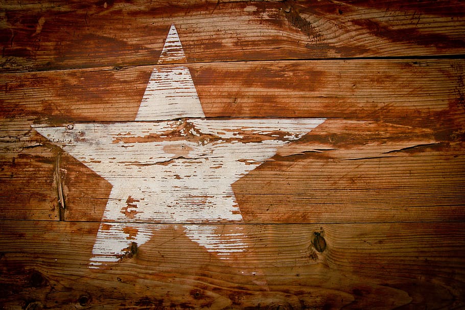 closeup photo of brown and white star-printed board, faded HD wallpaper